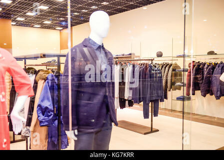 Blurred Storefront of men's clothing modern casual style. Selective focus. Space for text. Stock Photo