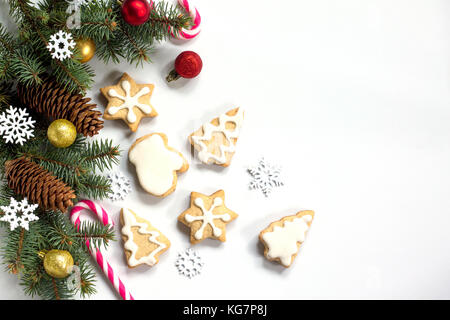 Christmas background gingerbread, stars, Christmas tree and decorations isolated on white background. Stock Photo