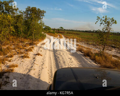 Sandy road crossing the remote Jalapão National Park, Tocantins estate, Brazil Stock Photo