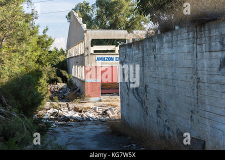 Amazon Enterprises LTD. sign on abandoned industrial building in Larnaca, Cyprus Stock Photo