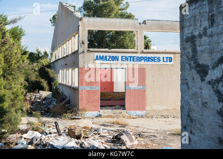 Amazon Enterprises LTD. sign on abandoned industrial building in Larnaca, Cyprus Stock Photo
