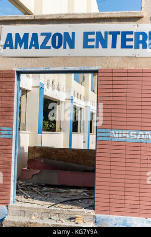 Amazon Enterprises LTD. sign on abandoned industrial building in Larnaca, Cyprus Stock Photo