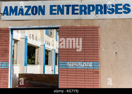 Amazon Enterprises LTD. sign on abandoned industrial building in Larnaca, Cyprus Stock Photo
