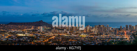 A view of the Honolulu skyline from Tantalus drive lookout at sunset. Stock Photo