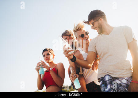 Group of young happy friends having fun time Stock Photo