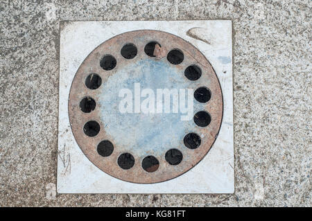 Fllor drain grate on the floor in industrial area Stock Photo