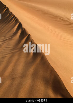 Desert sand pattern for background, diagonal line, colors and shadows, vertical frame Stock Photo