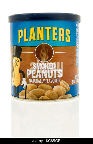 Winneconne, WI - 31 October 2017:  A container of planters smoked peanuts on an isolated background. Stock Photo