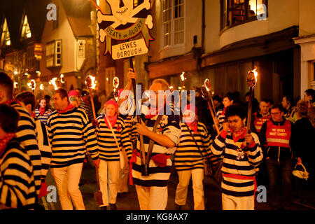 Lewes, UK - 4 November 2017: Participants from Borough Bonfire Society in torchlit processions at Lewes Bonfire night. Credit: Scott Hortop/Alamy Live News Stock Photo