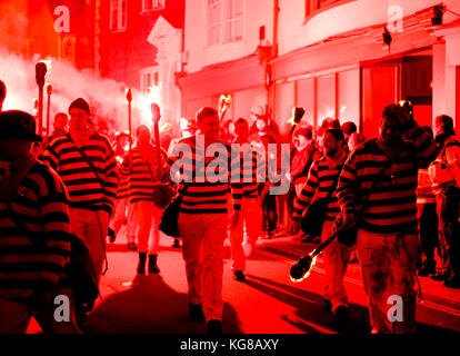 Lewes, UK - 4 November 2017: Participants from Borough Bonfire Society in torchlit processions at Lewes Bonfire night. Credit: Scott Hortop/Alamy Live News Stock Photo