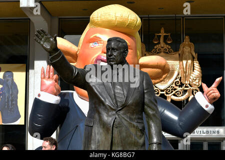 Philadelphia, United States. 04th Nov, 2017. 'Trump Rat' inflatable sculpture is erected behind the Frank Rizzo statue during a Refuse Fascism rally protesting the Trump/Pence administration, on November 4, 2017, in Philadelphia, PA. City Officials recently announced the removal and relocation of the controversial statue of the former mayor and police commissioner. Credit: Bastiaan Slabbers/Alamy Live News Stock Photo