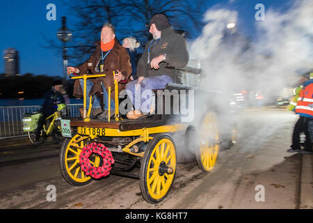 London, UK. 5th November, 2017. Arriving at dawn before the start in Hyde Park - The London to Brighton Veteran Car Run, which dates back to 1927, was founded to commemorate the Emancipation Run of 1896, which celebrated the new-found freedom of motorists granted by the ‘repeal of the Red Flag Act.’ The Act raised the speed limit to 14mph and abolished the need for a man carrying a red flag to walk ahead of the cars whenever they were being driven. Credit: Guy Bell/Alamy Live News Stock Photo