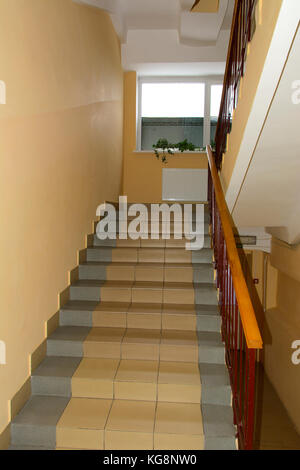 A staircase between the floors in the Zhytomyr higher educational institution in Ukraine. October 2017. Stock Photo