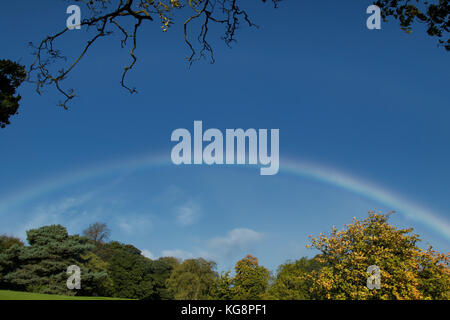 Rainbow over The Valley Gardens,Harrogate,North Yorkshire,England,UK. Stock Photo