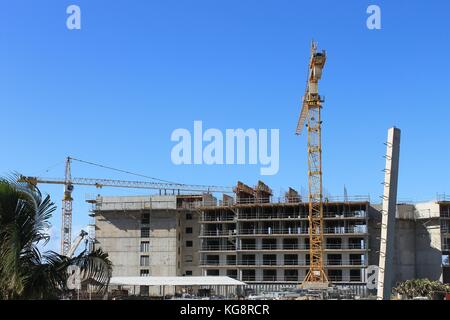 Cranes working on construction site, Varadero, Cuba Stock Photo