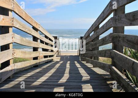 Wooden boardwalk and staircase leading down to the beach, Ormond Beach, Florida, USA Stock Photo