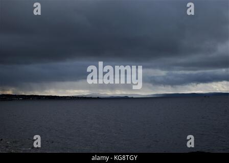 Storm Clouds gathering over the bay, Conception Bay, Newfoundland. Looking from Conception Bay south across the water to Conception Bay North. Stock Photo