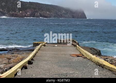 Pier jutting out into the bay, Flatrock, Newfoundland Labrador Stock Photo