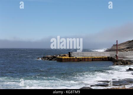 Pier jutting out into the bay, Flatrock, Newfoundland Labrador Stock Photo