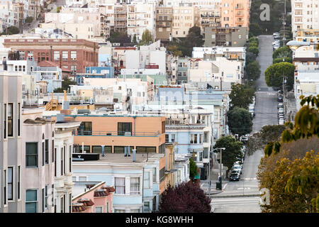San Francisco downtown city scene looking down Greenwich Street towards the Russian Hill neighborhood with a colorful background of historic buildings Stock Photo