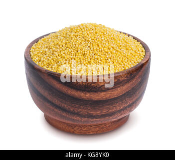 Millet in wooden bowl isolated on white background Stock Photo