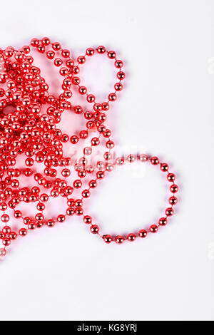 Red beads garland for decoration. Stock Photo
