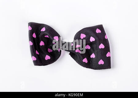 Black patterned bow tie on white background. Stock Photo