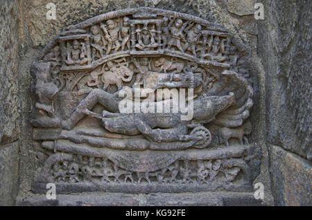 Carved idol of Lord Vishnu on the inner wall of a small shrine. Built in 1026 - 27 AD during the reign of Bhima I of the Chaulukya dynasty, Modhera vi