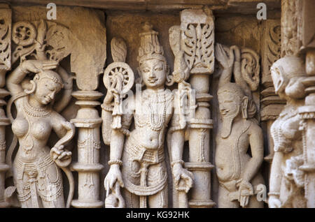 Carved idols on the inner wall of Rani ki vav, an intricately constructed stepwell on the banks of Saraswati River.  Patan, Gujarat, India. Stock Photo