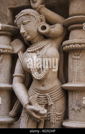 Carved idols on the inner wall of Rani ki vav, an intricately constructed stepwell on the banks of Saraswati River.  Patan, Gujarat, India. Stock Photo