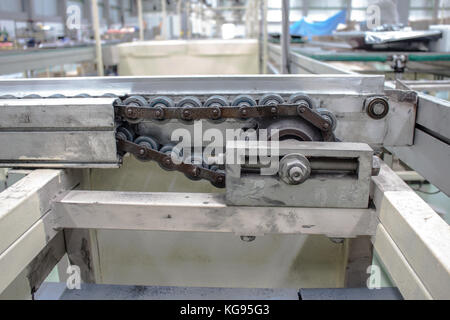 The Equipment chain tensioning Line of Conveyor Stock Photo