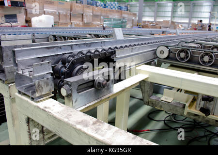 The Equipment chain tensioning Line of Conveyor Stock Photo