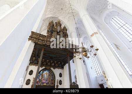 Baroque church pipe organ at the empty Basilica of the Assumption of the Blessed Virgin Mary (also known as St. Mary's Church) in Gdansk, Poland. Stock Photo