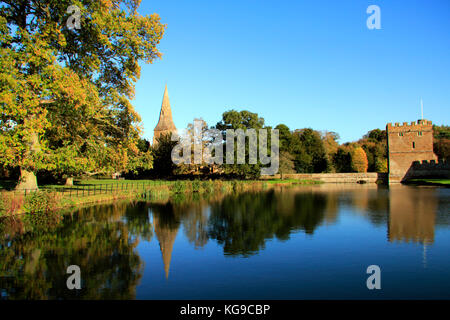 Autumn trees in the grounds at Broughton Castle near Banbury, Oxfordshire Stock Photo