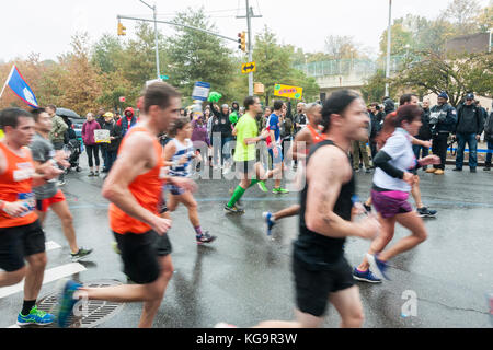 New York, USA. 05th Nov, 2017. Runners pass through Harlem in New York near the 22 mile mark near Mount Morris Park on Sunday, November 5, 2017 in the 47th annual TCS New York City Marathon. About 50,000 runners from over 120 countries are expected to compete in the race, the world's largest marathon. ( © Richard B. Levine) Credit: Richard Levine/Alamy Live News Stock Photo