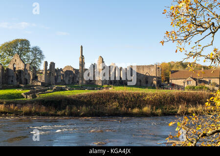 Autumn view of Finchale Priory, seen across the river Wear, Co. Durham, England, UK Stock Photo