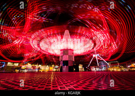 Light trails from an amusement ride at the Minnesota State Fair. Stock Photo