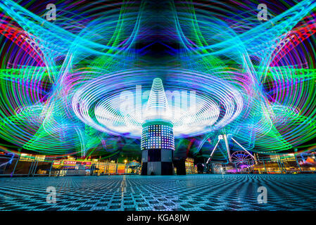 Light trails from an amusement ride at the Minnesota State Fair. Stock Photo