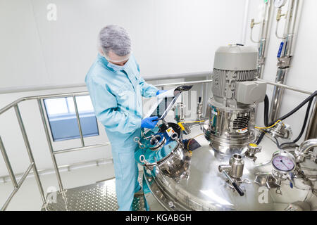 scientist in checking the readings Stock Photo