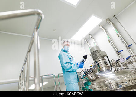 scientist in checking the readings Stock Photo