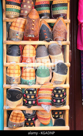 Traditional moroccan babushi - soft leather shoes, souk in Essaouira, Morocco, North Africa Stock Photo