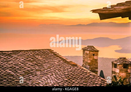 Amazing view from a slate roof with chimneys of a traditional house in Pelion on the mountain of the gods called Olympos. Stock Photo