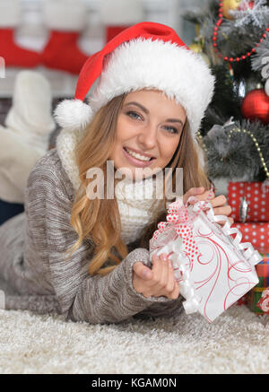 young blond woman with present box Stock Photo - Alamy