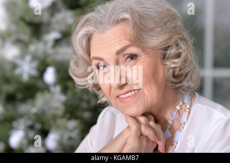 Senior woman preparing for Christmas Stock Photo