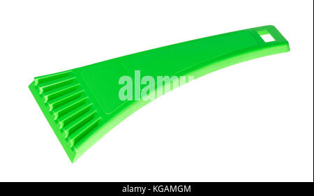 Green car ice scraper from snow isolated on white background Stock Photo