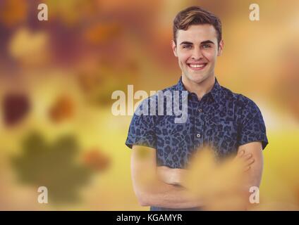 Digital composite of Man in forest with leaves Stock Photo