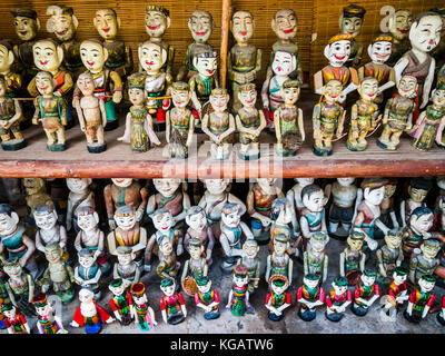 Rows of traditional water puppet dolls in Hanoi, Vietnam Stock Photo