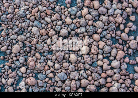 Red expanded clay aggregate for abstract background Stock Photo