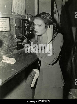 American actress Gene Tierney speaks at the telephone Stock Photo