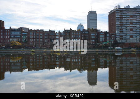 Reflection of the Boston Back Bay skyline in Autumn seen from the Charles River Esplanade Stock Photo